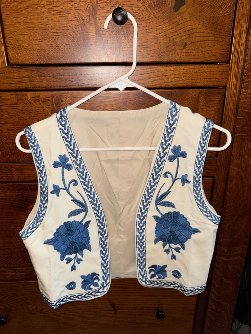 Embroidered White Vest with Blue Floral Detail